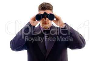 Search - businessman looking through binoculars