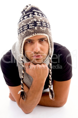 fashionable man posing in woolen cap
