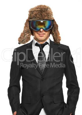 man in ski goggles and black suit