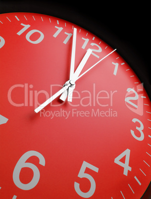 red clock face