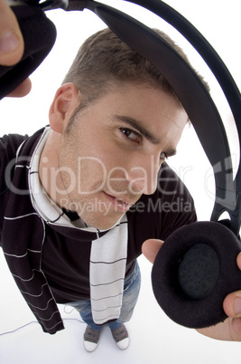 handsome man holding headphone