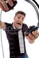 male dj holding headphone