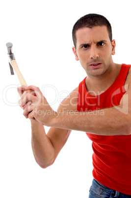 handsome man holding hammer