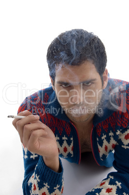 laying smoking man looking at camera