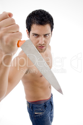 angry male showing dagger