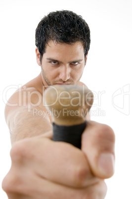 muscular man holding wooden stick