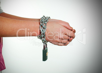 Hands tied up with chains