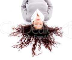 woman laying down on floor with hair spread out