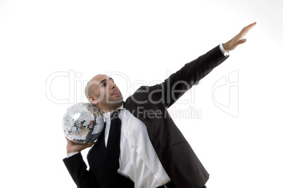 young corporate man about to throw the disco ball