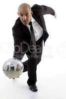 smart young executive tumbling disco ball