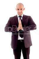 businessman standing joining both hands
