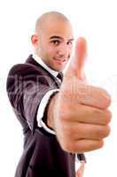 executive showing thumbs up