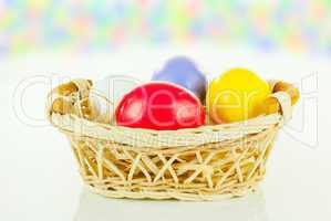 Colorful Easter eggs in a basket