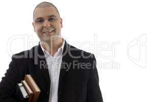 smiling businessman with books