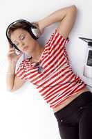laying woman listening music