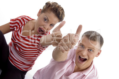 corner view of couple with thumbs up