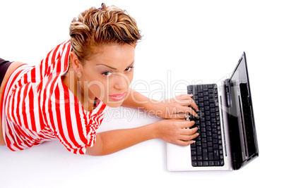 laying woman with laptop