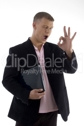 male holding files and showing ok sign