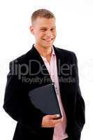pleased businessman holding laptop