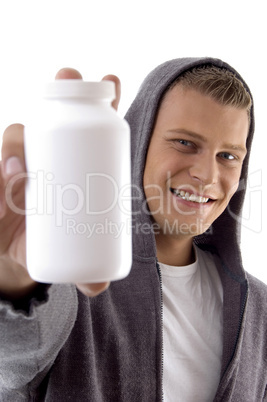 close up of man with medicine bottle