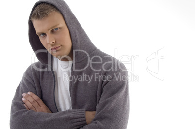 portrait of young handsome man with crossed arms