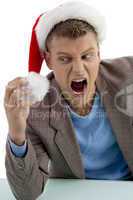 shouting young man with christmas hat
