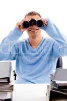 young professional looking through binocular
