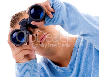 young man looking through binocular