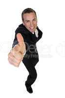 successful businessman showing thumbsup