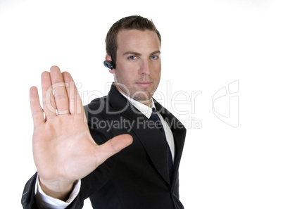 businessman holding hand out in protest