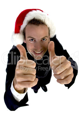 businessman cheering with santa cap