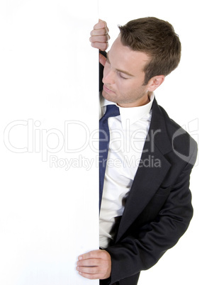 businessman posing with white banner