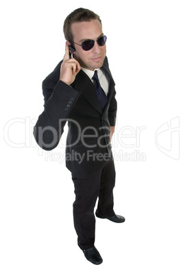 businessman with bluetooth and sunglasses