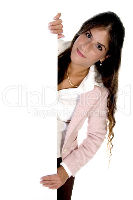 young woman holding blank board