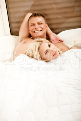 Smiling young couple relaxing