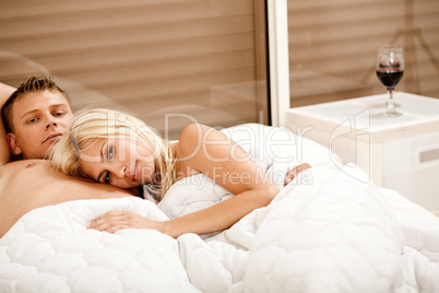 Mid adult couple in bedroom