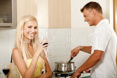 Man cooking and smiling Man cooking and smiling