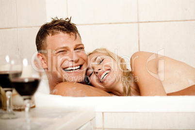 Happy couple bathing