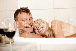 Happy couple bathing