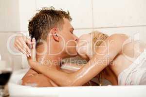 Couple making love in bath