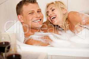 Affectionate couple bathing
