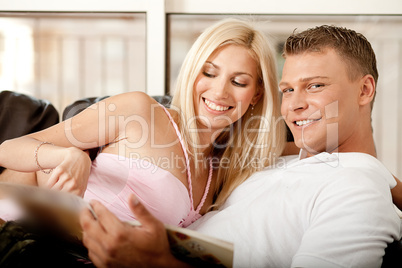 Couple reading a book