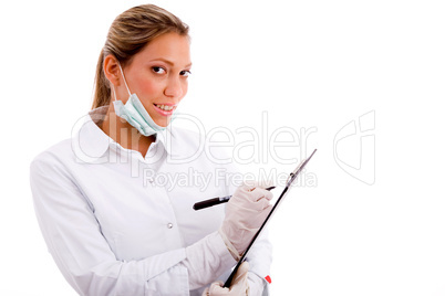 portrait of smiling medical professional with writing pad