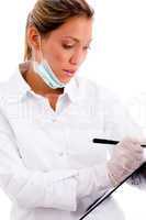 front view of doctor writing prescription