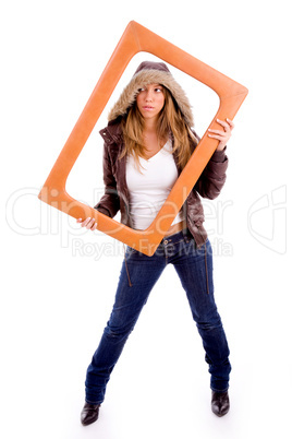 front view of sexy woman holding frame