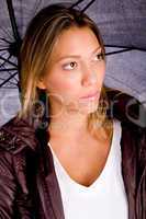 portrait of young female carrying umbrella