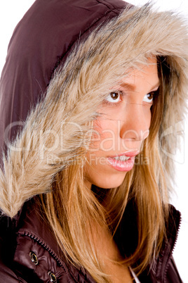 portrait of young woman wearing winter coat