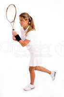 side view of tennis player holding racket