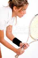 side view of tennis player with racket