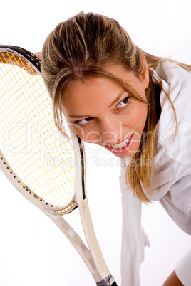 front view of young tennis player with racket
